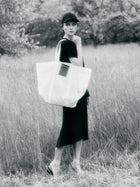 Pekin Neon bag with hand-embossed logo on leather