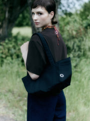 Petite Baguette cotton bag with hand-stamped logo on leather